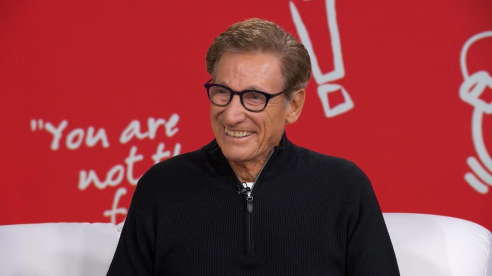 Television host Maury Povich smiling