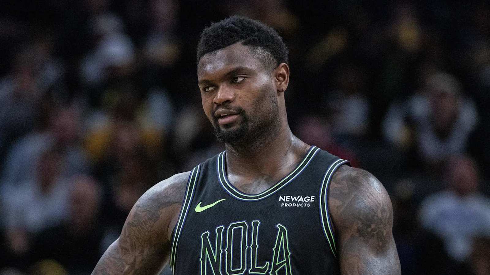 Basketball players on court during game