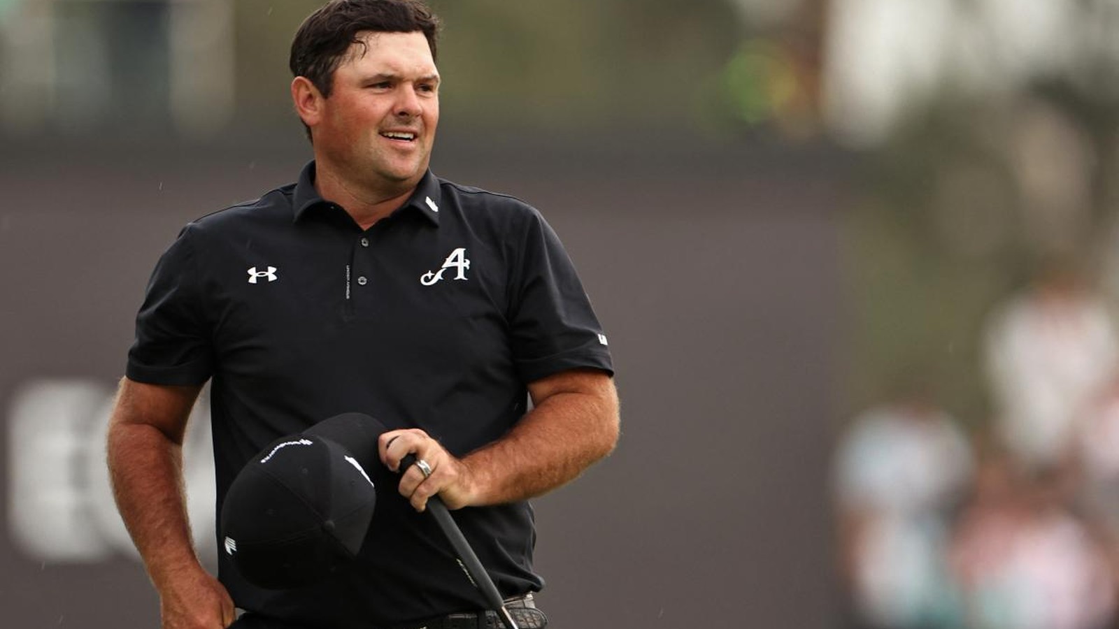 Golfer Patrick Reed during a swing