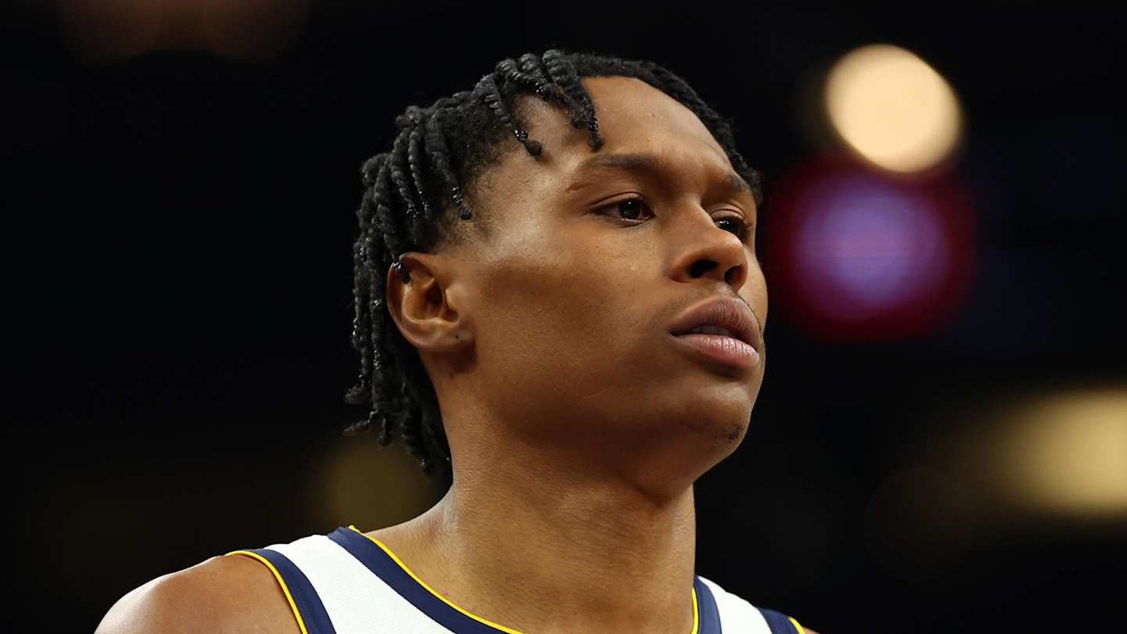 Peyton Watson basketball action