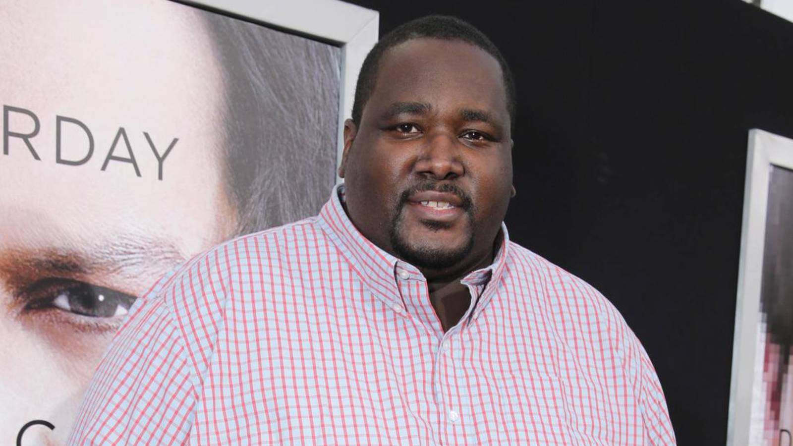 Quinton Aaron smiling