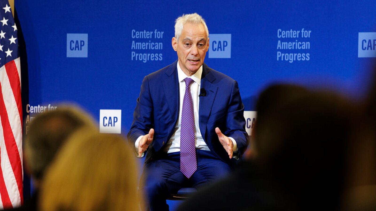 Rahm Emanuel at a podium