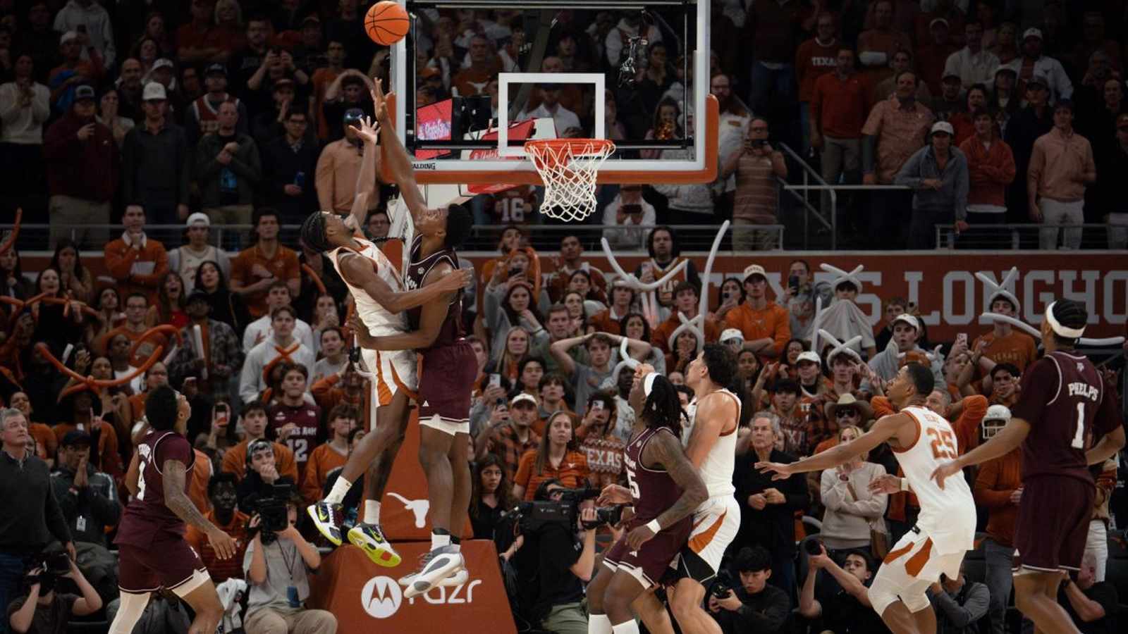 Texas AM Aggies basketball players on court