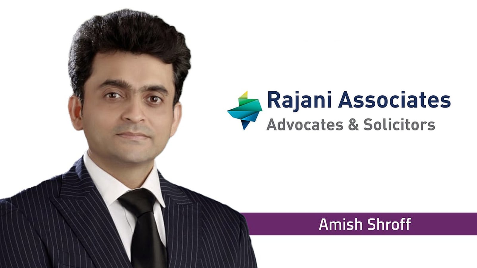 Business professionals shaking hands over documents