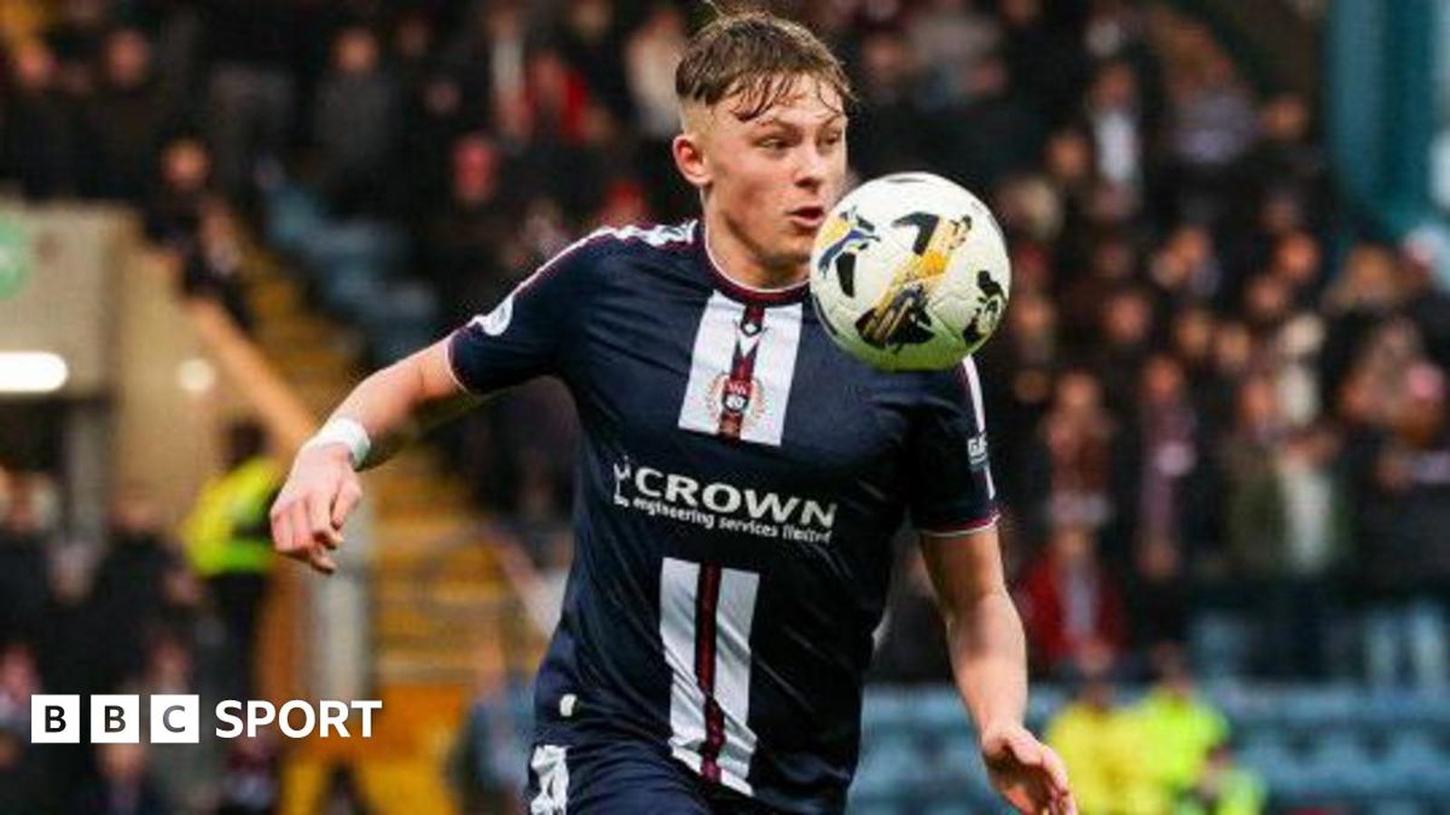 Luke Graham playing football