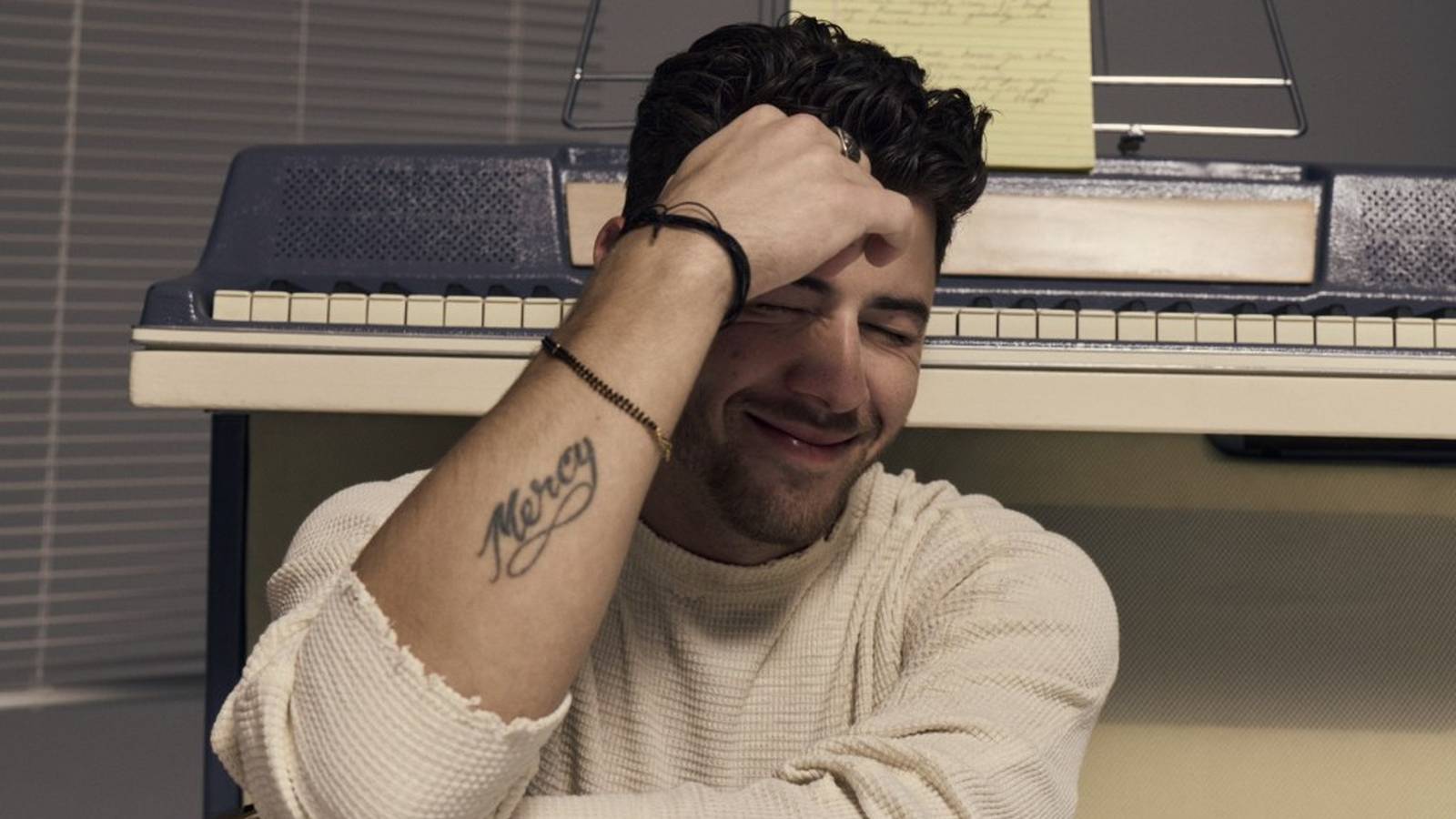 Singer Nick Jonas on album cover