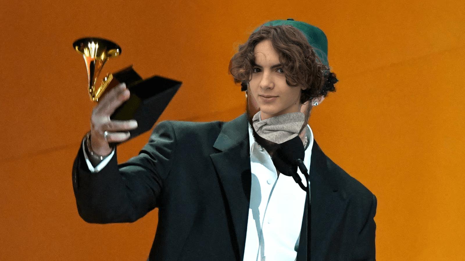 Olivia Dean performing on stage