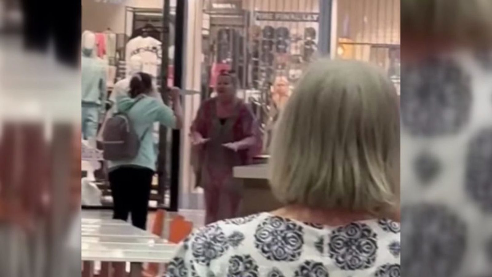 woman knife threatening bystanders