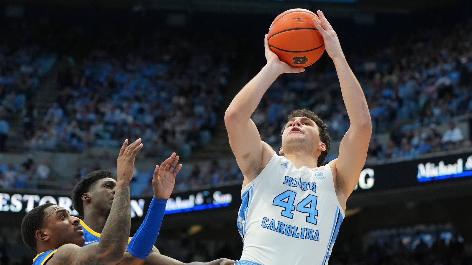 Zayden High playing basketball