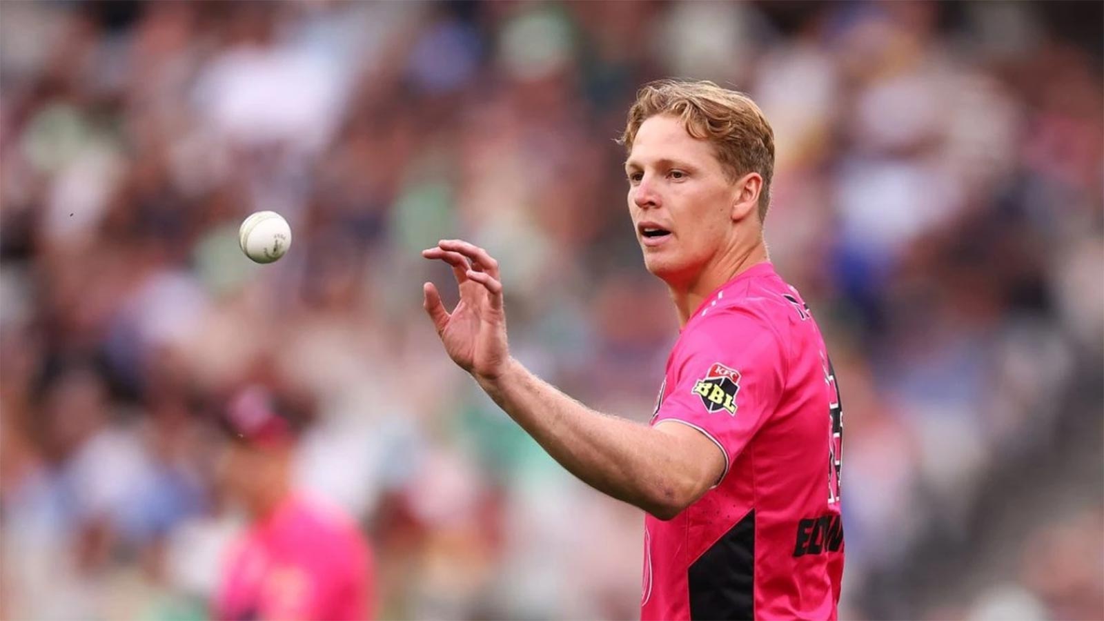 Jack Edwards catching cricket ball