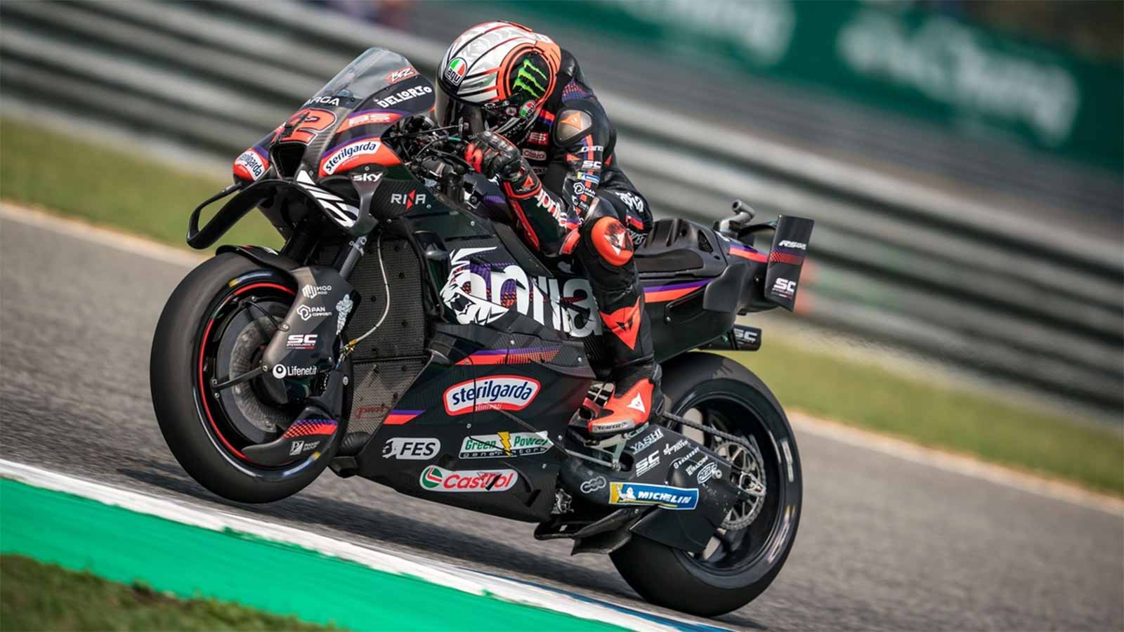 Marco Bezzecchi riding Aprilia motorcycle