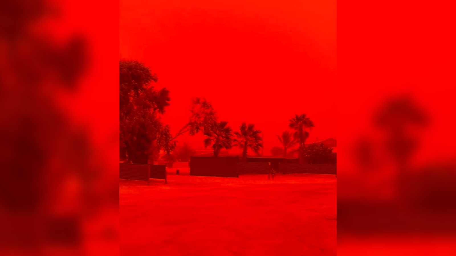 Dust storm over Australian landscape