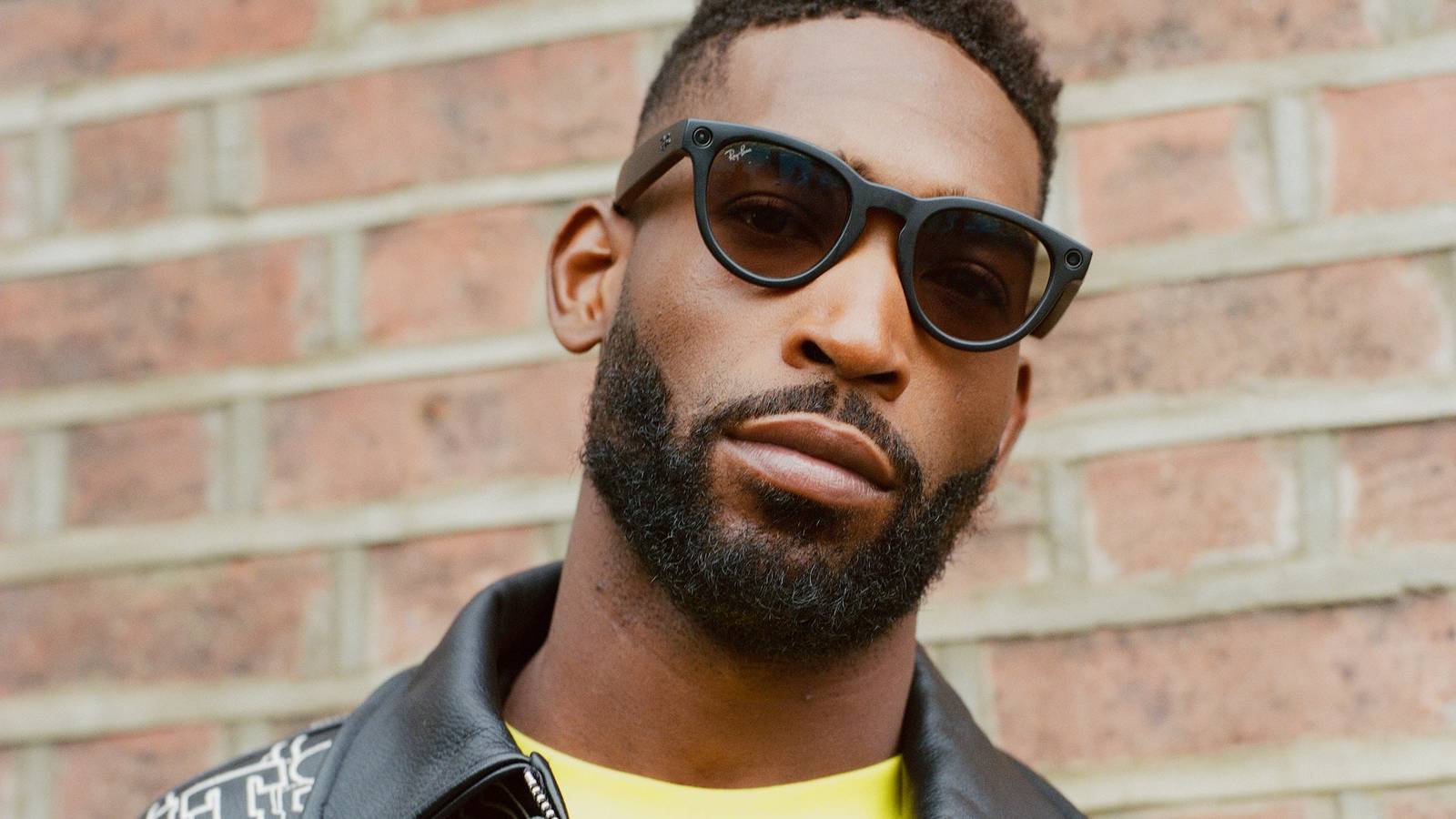 King Charles greeting rapper Tinie Tempah