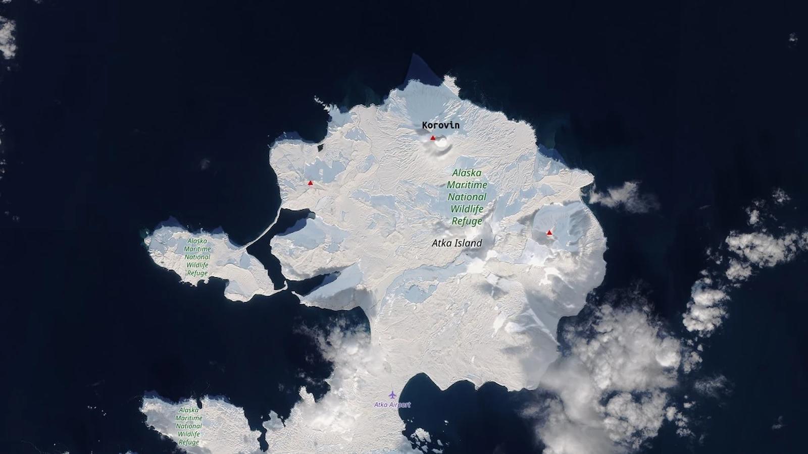 Snow-covered volcanic peak landscape