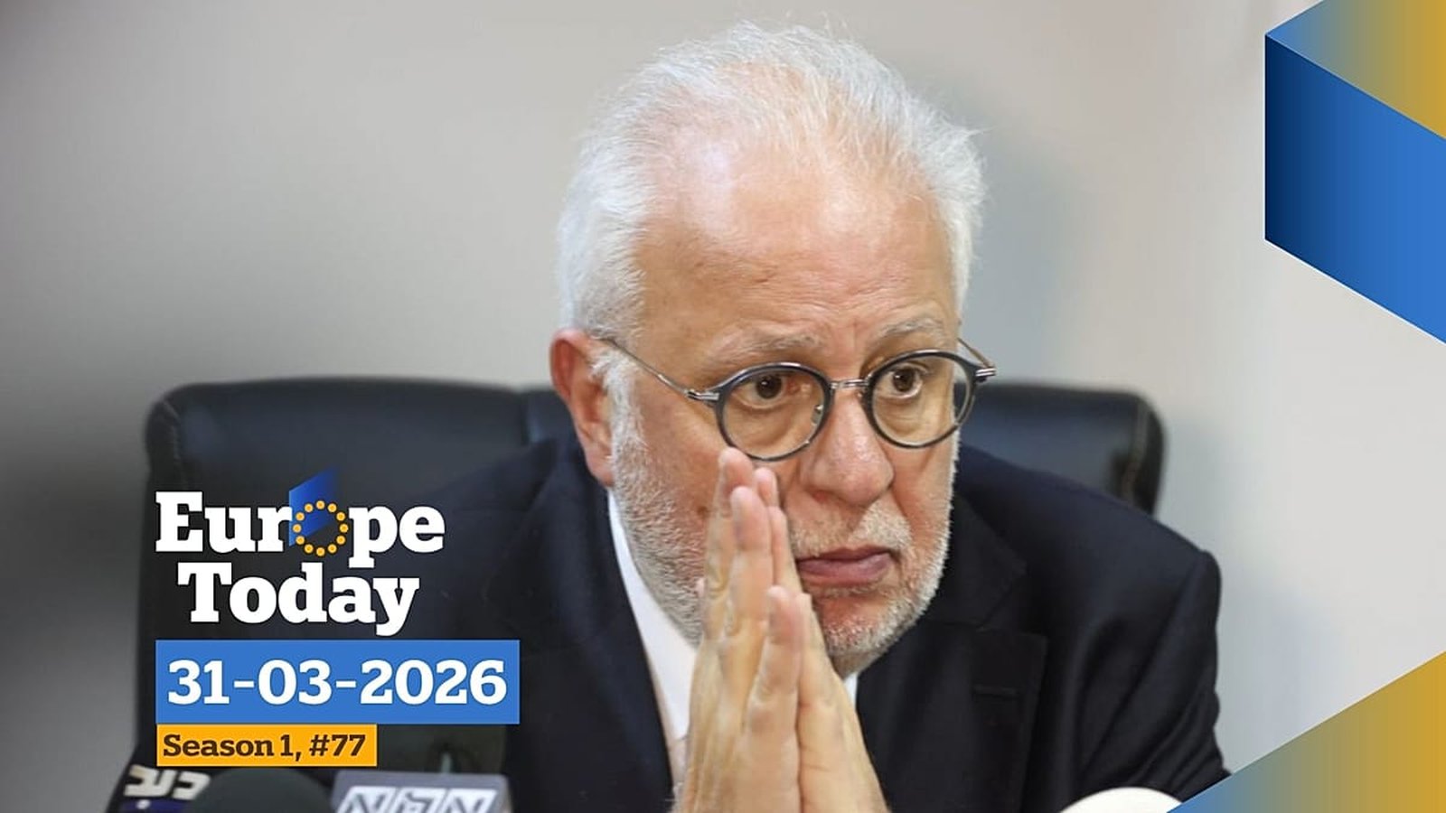 Justice Minister speaking at a podium