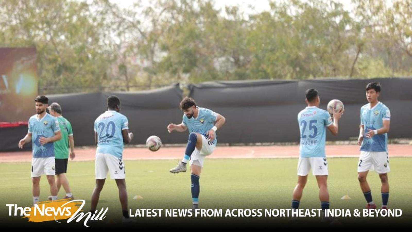 Real Kashmir football players in home stadium action