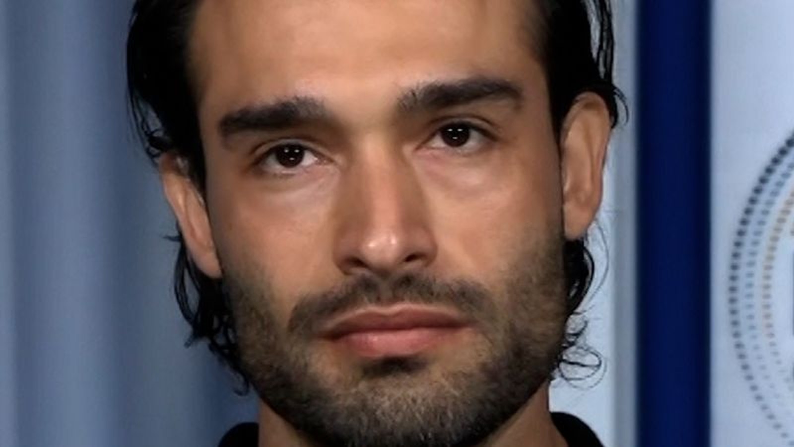 Sam Asghari speaking on television