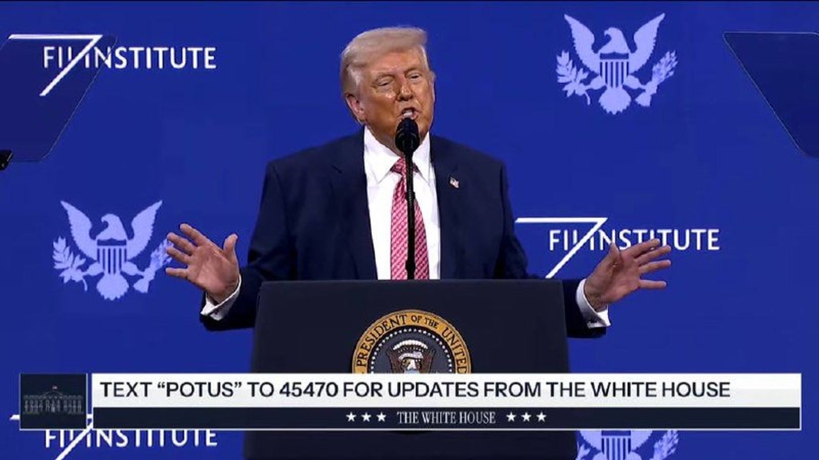 President Donald Trump speaking at a podium