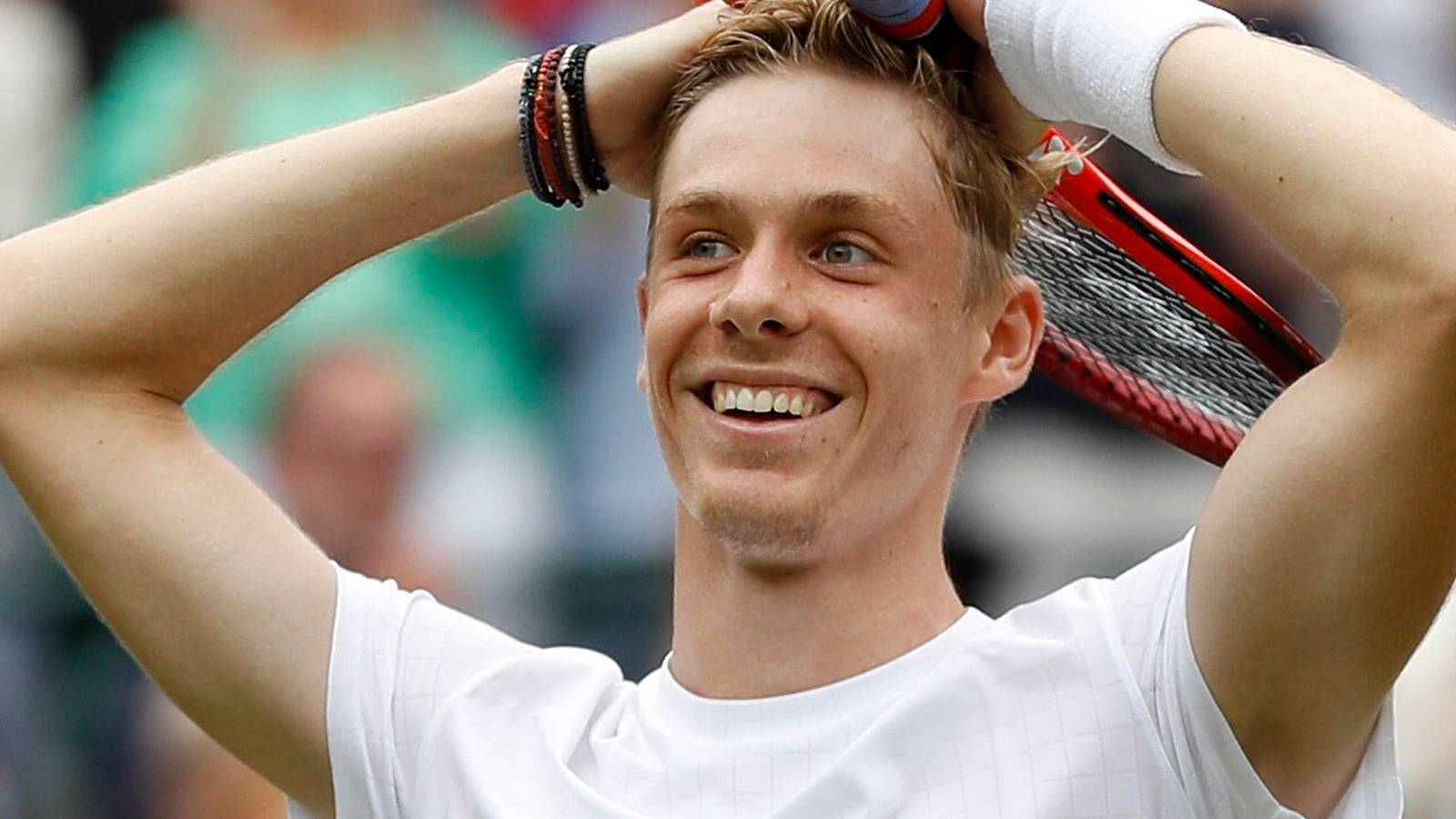 Two male tennis players on a court