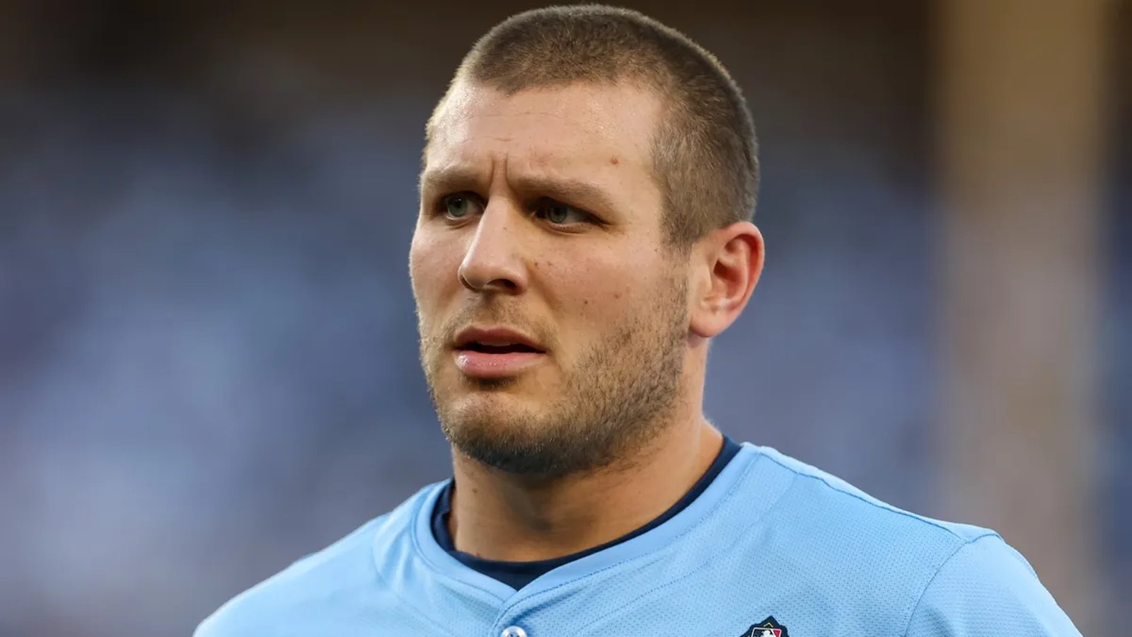 Close up portrait of Toronto Blue Jays outfielder Daulton Varsho wearing light blue jersey