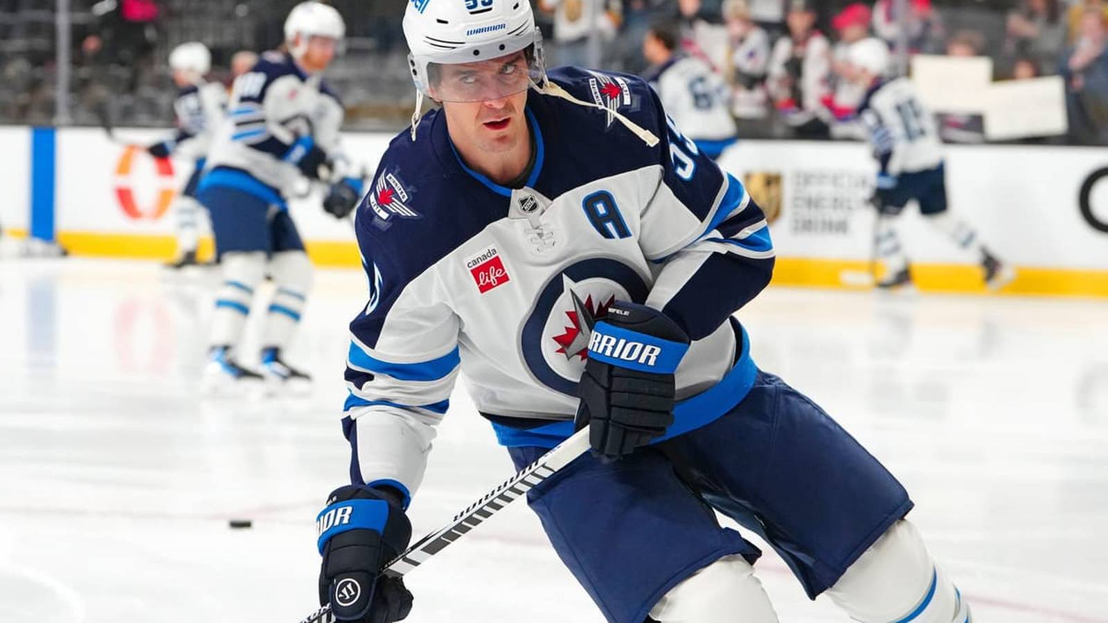 Winnipeg Jets forward Mark Scheifele skating on the ice during a hockey game