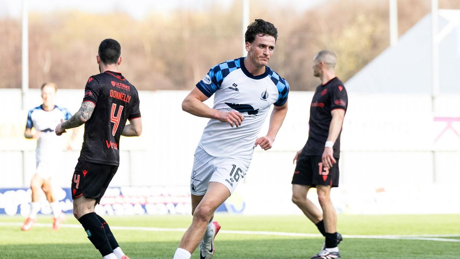 Falkirk footballer Barney Stewart running on the pitch during a professional match