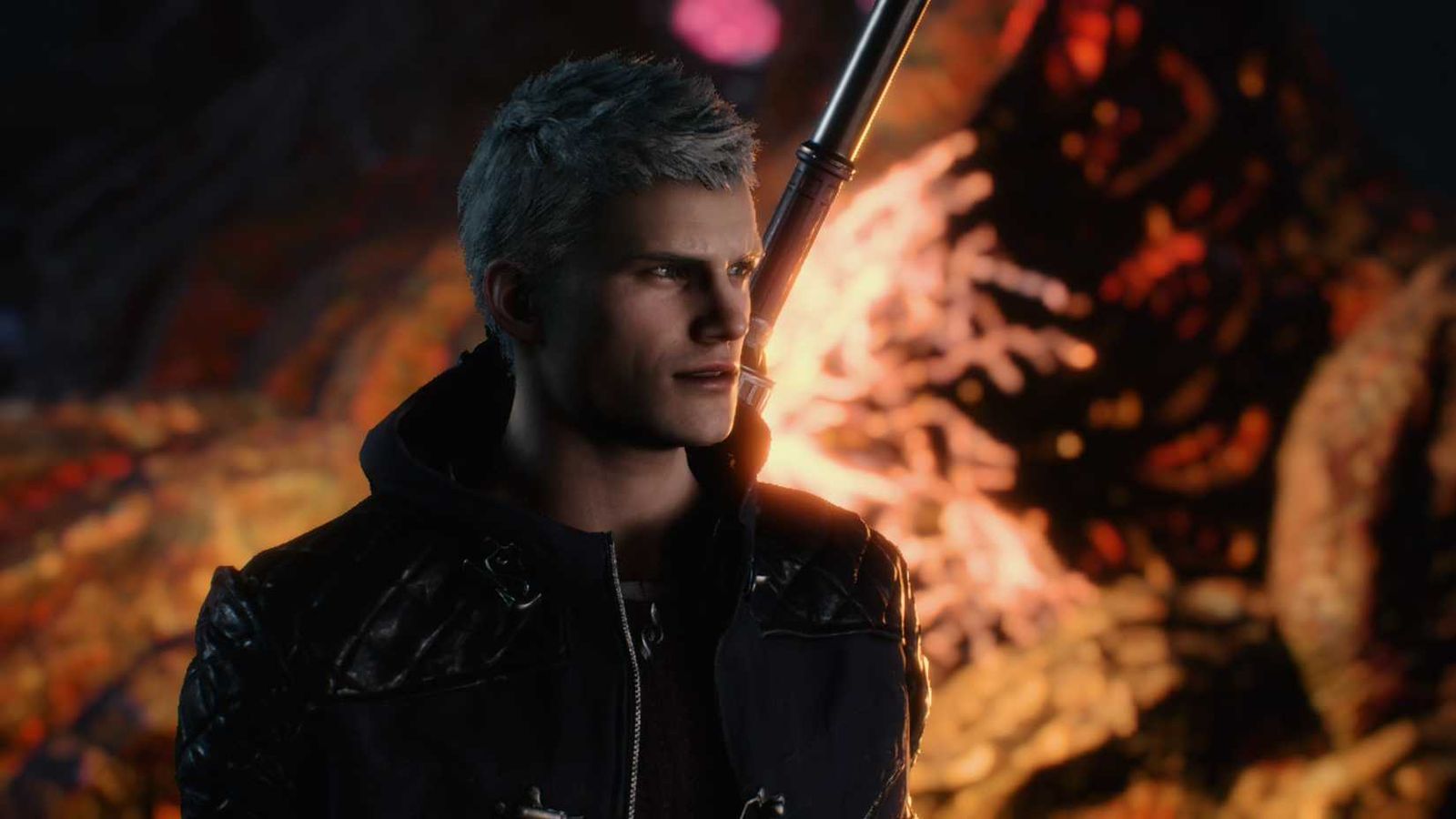 Nero with short silver hair wearing a black jacket in Devil May Cry 5