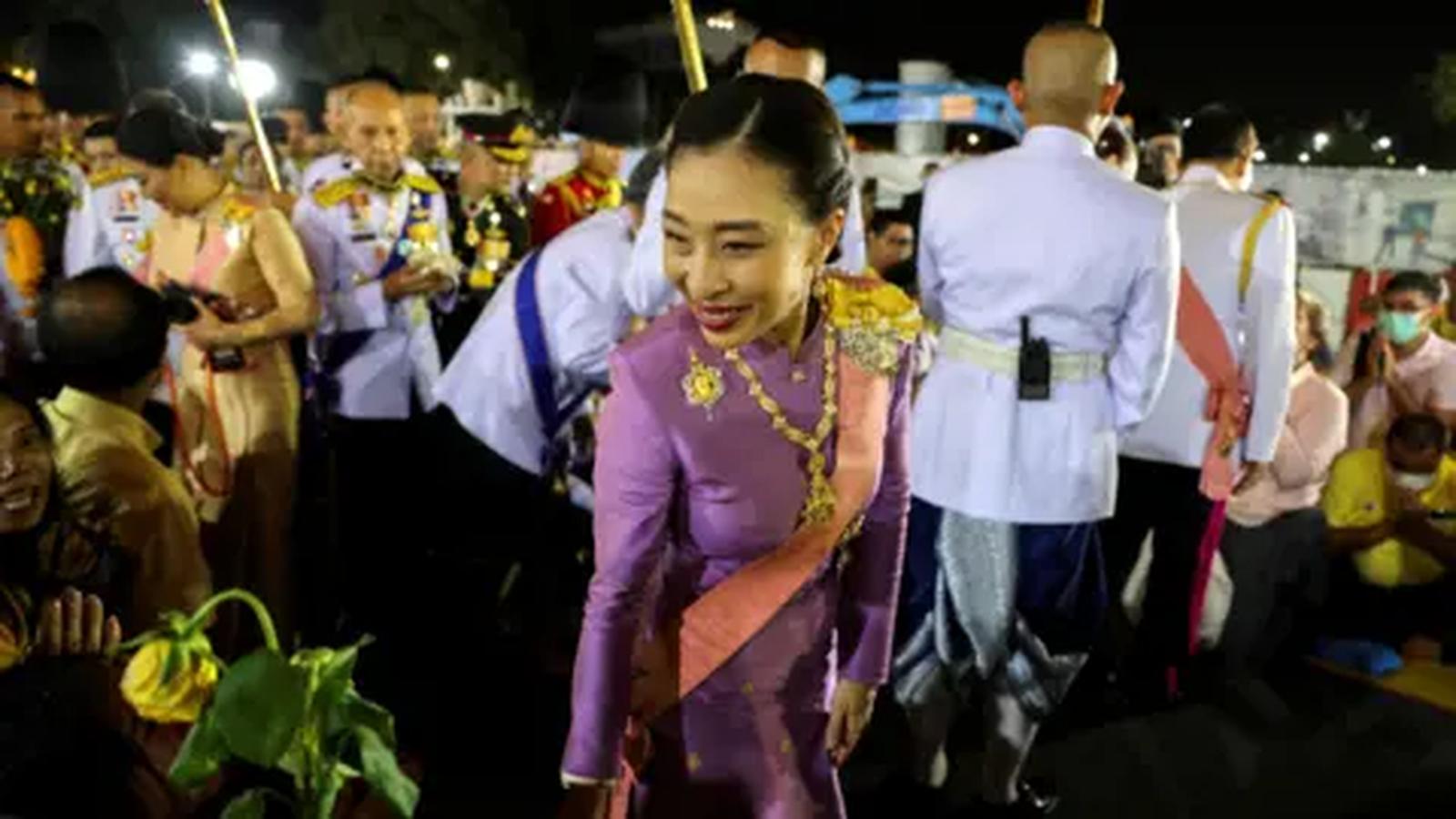Princess Bajrakitiyabha wearing a purple traditional Thai dress at a public ceremony