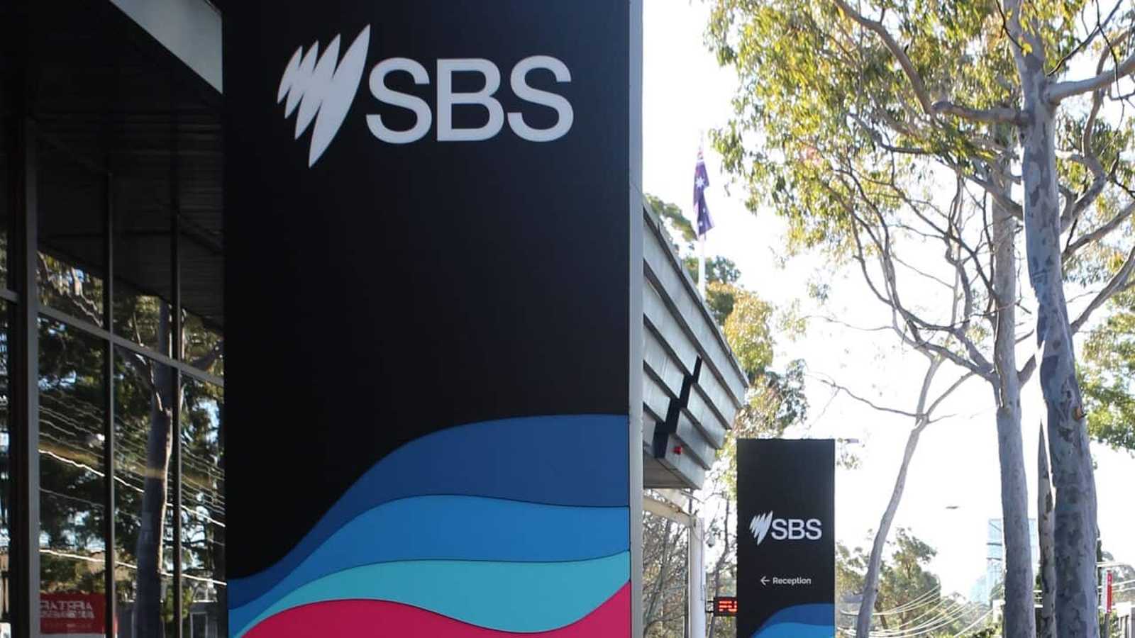 The SBS Australia logo on a large black sign outside the headquarters building