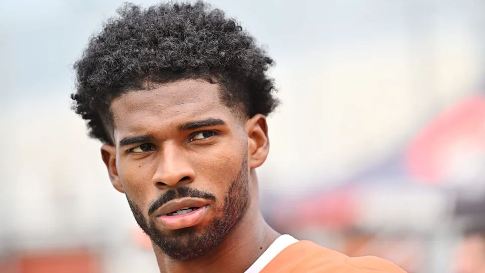 Close up portrait of quarterback Shedeur Sanders looking off to the side