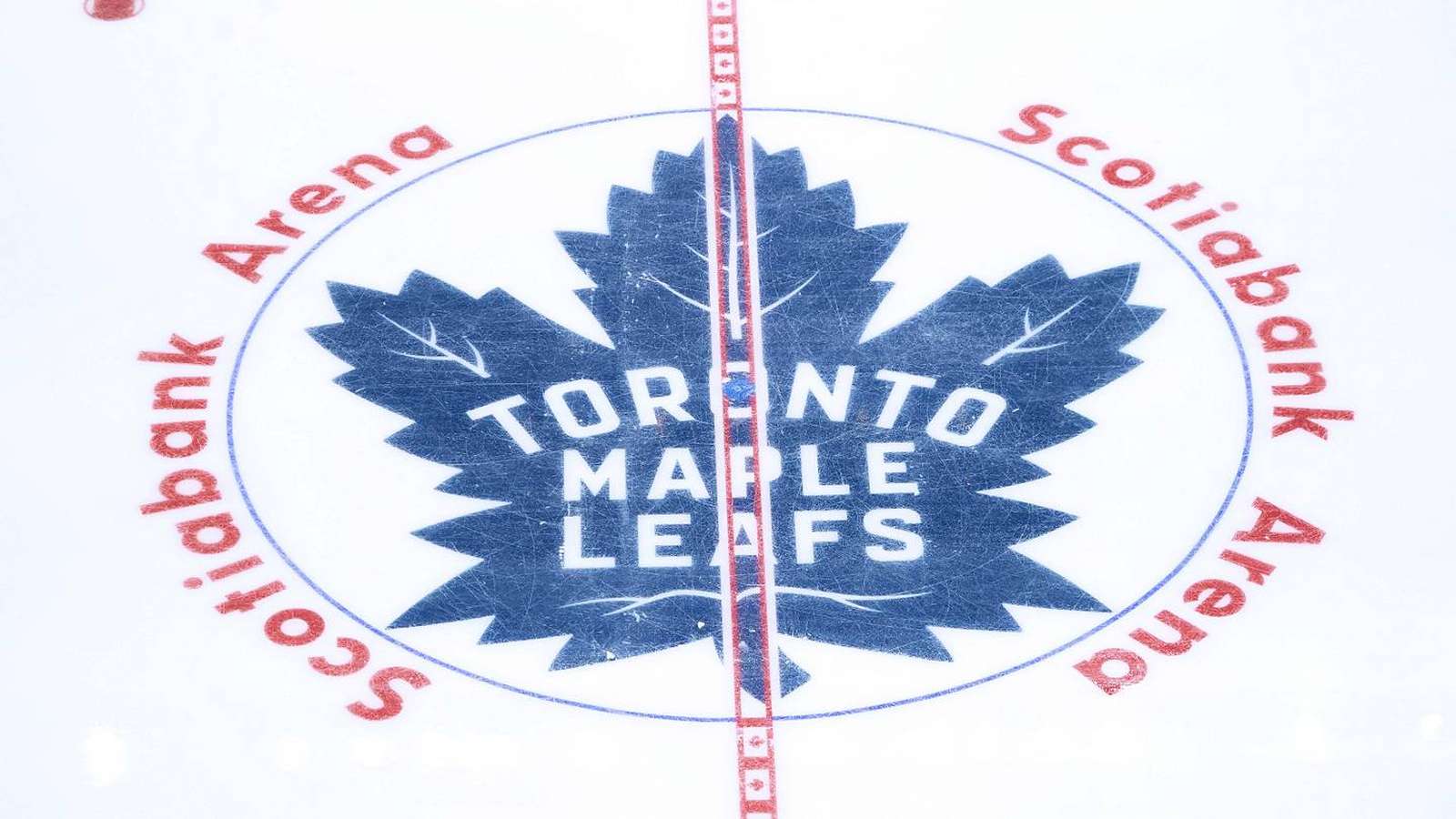 The Toronto Maple Leafs team logo painted on the ice at Scotiabank Arena