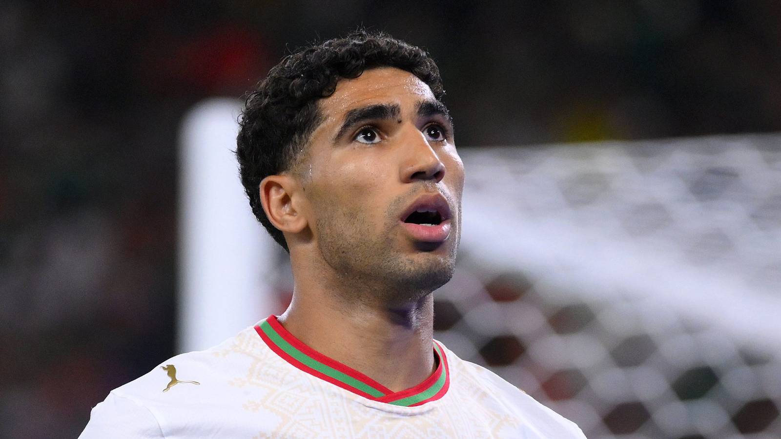 Close up portrait of Moroccan footballer Achraf Hakimi wearing his national team jersey
