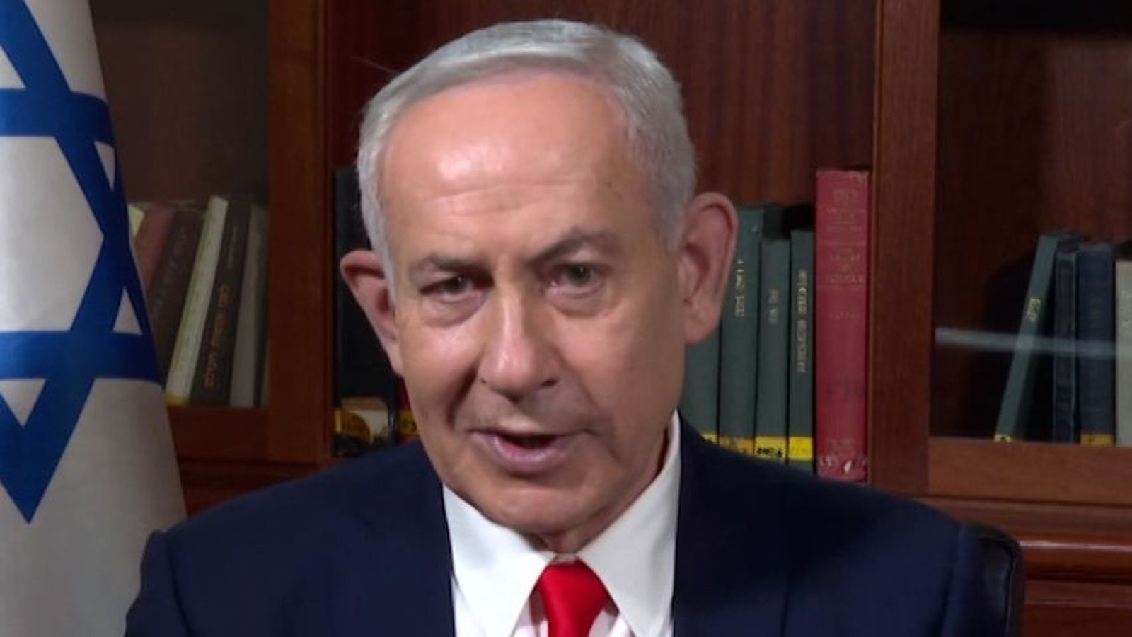 Israeli Prime Minister Benjamin Netanyahu speaking during a televised interview in his office