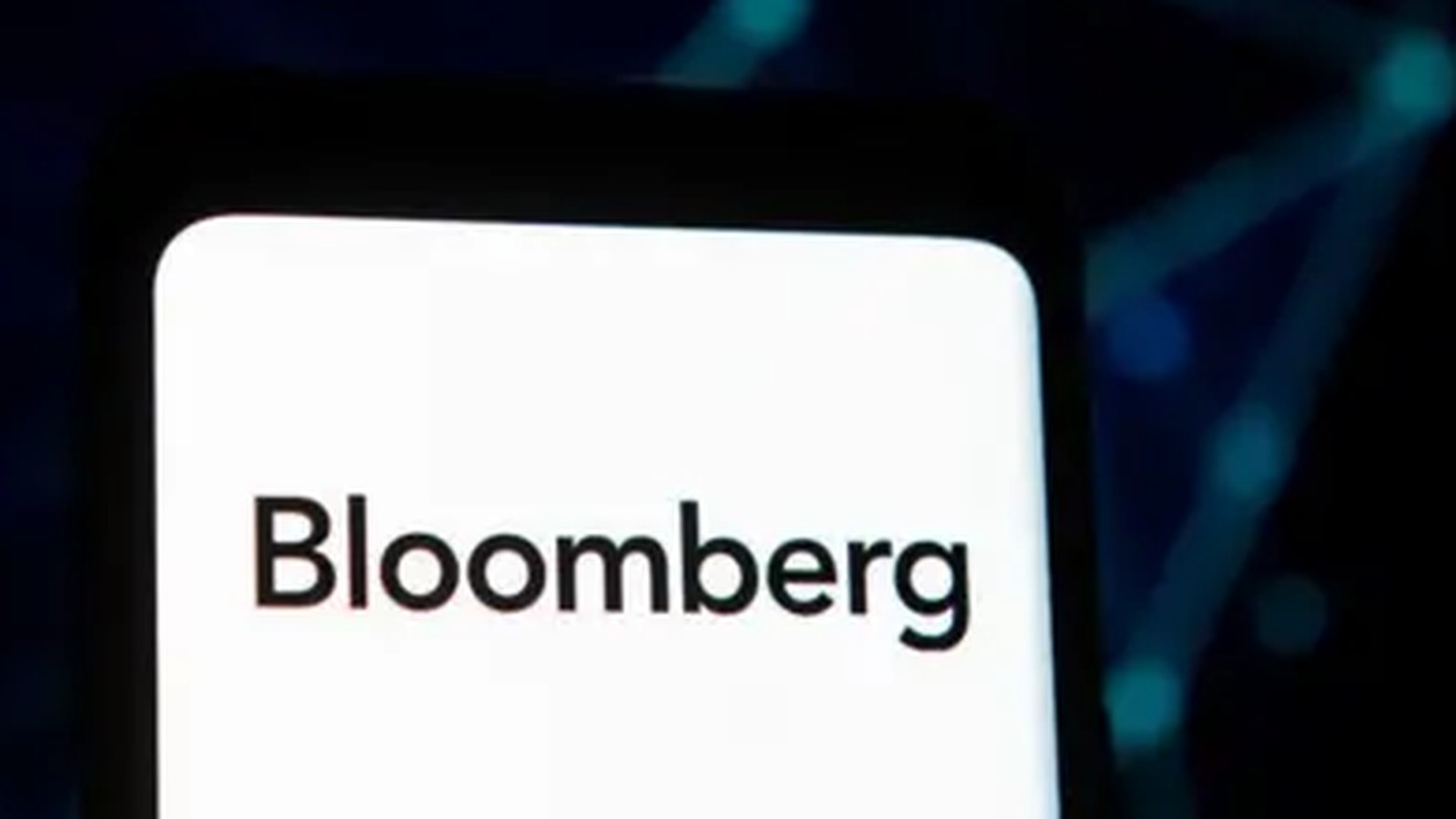 A close up of a smartphone screen displaying the black Bloomberg company logo