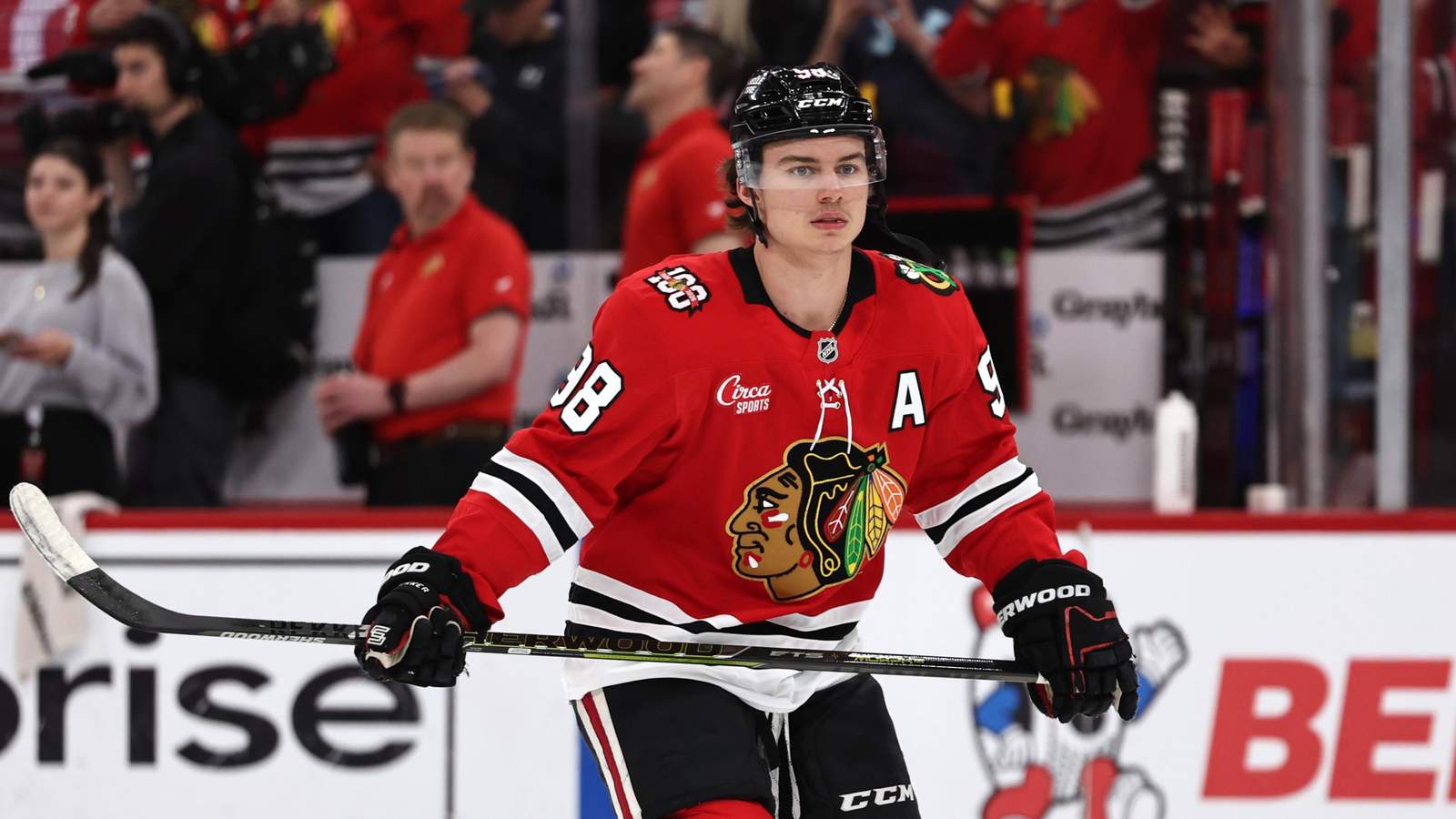 Chicago Blackhawks forward Connor Bedard wearing his red team jersey on the ice