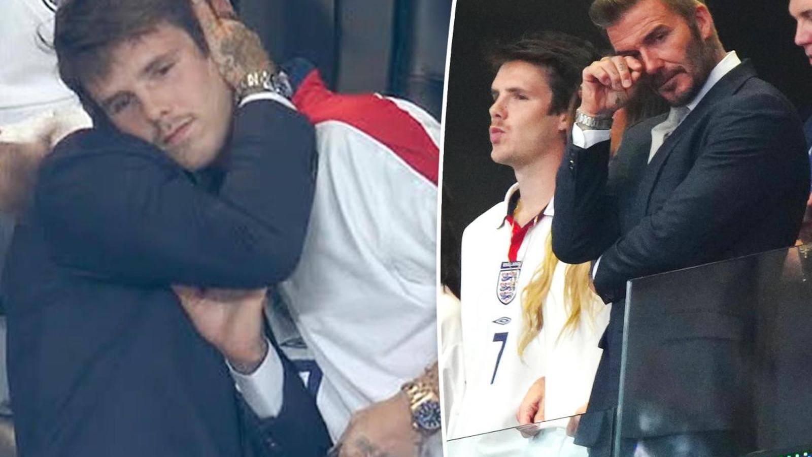 David Beckham and his son Cruz sitting together in a stadium box seat
