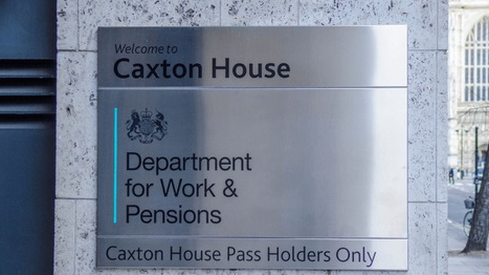 The metal sign for Caxton House, headquarters of the Department for Work and Pensions
