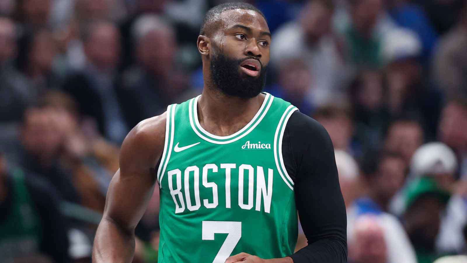 Jaylen Brown wearing a green Boston Celtics jersey during a professional basketball game