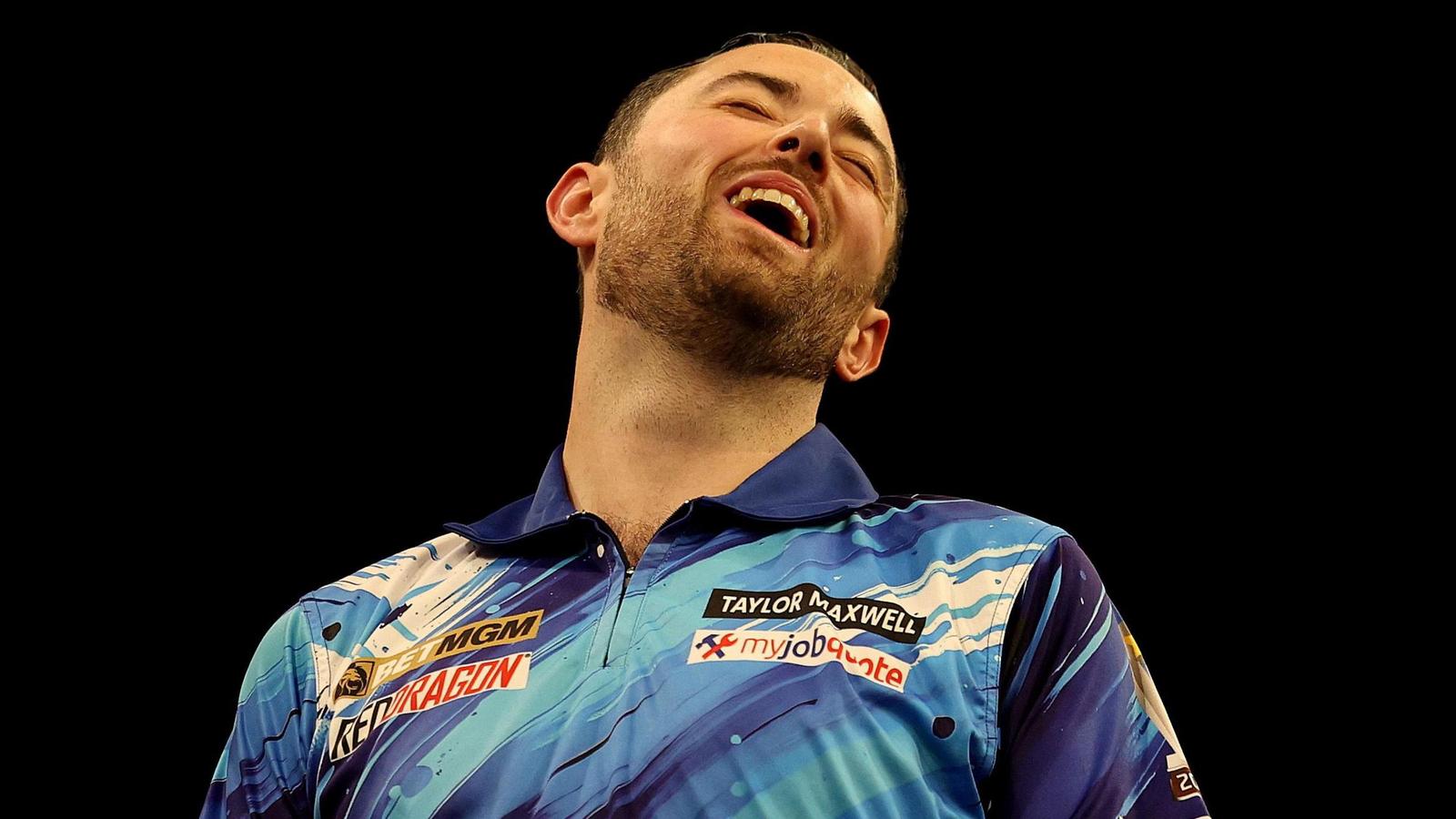 Professional darts player Luke Humphries looking frustrated during a match at the oche