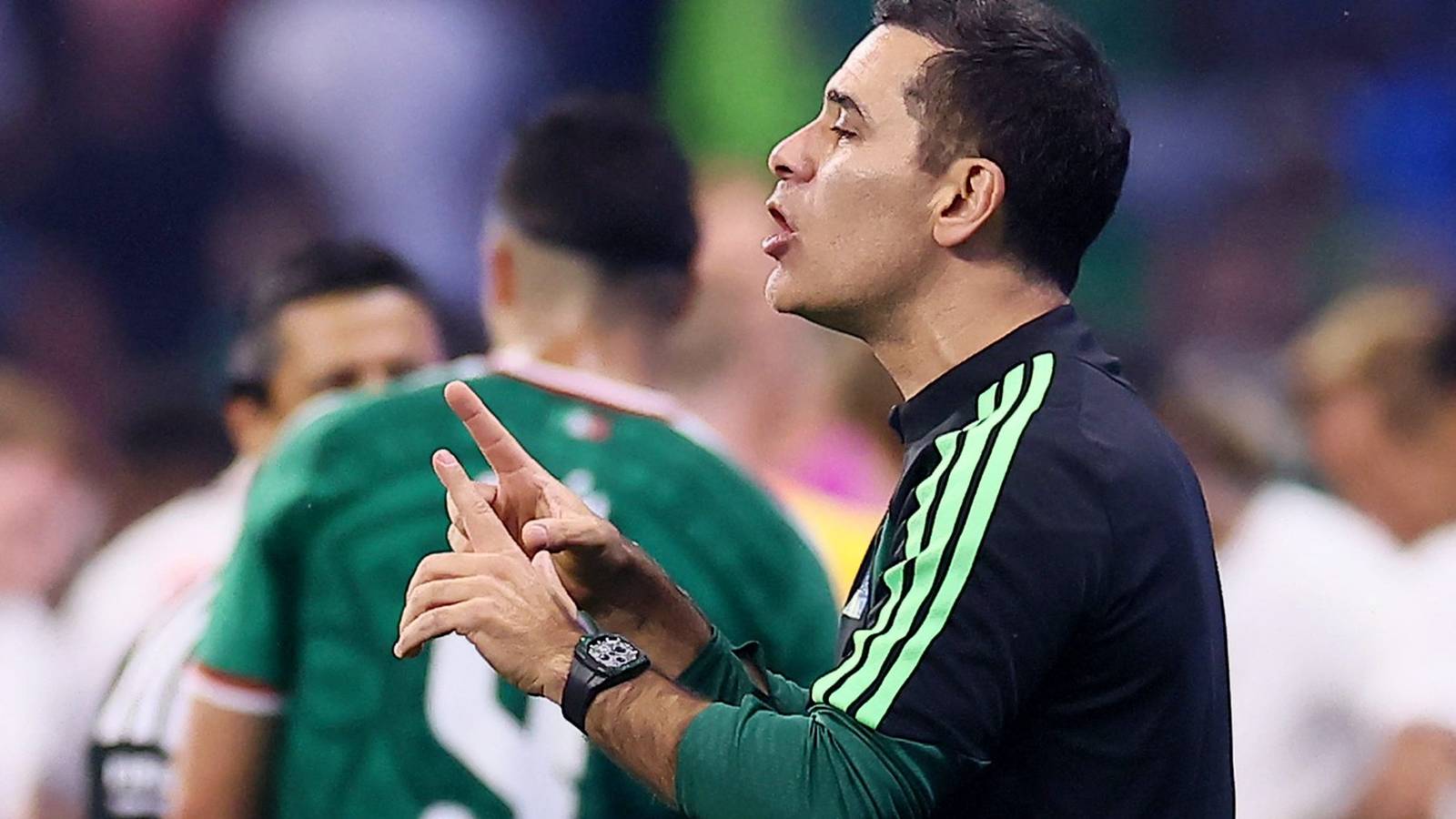 Rafa Marquez gesturing on the sidelines while coaching the Mexico national football team