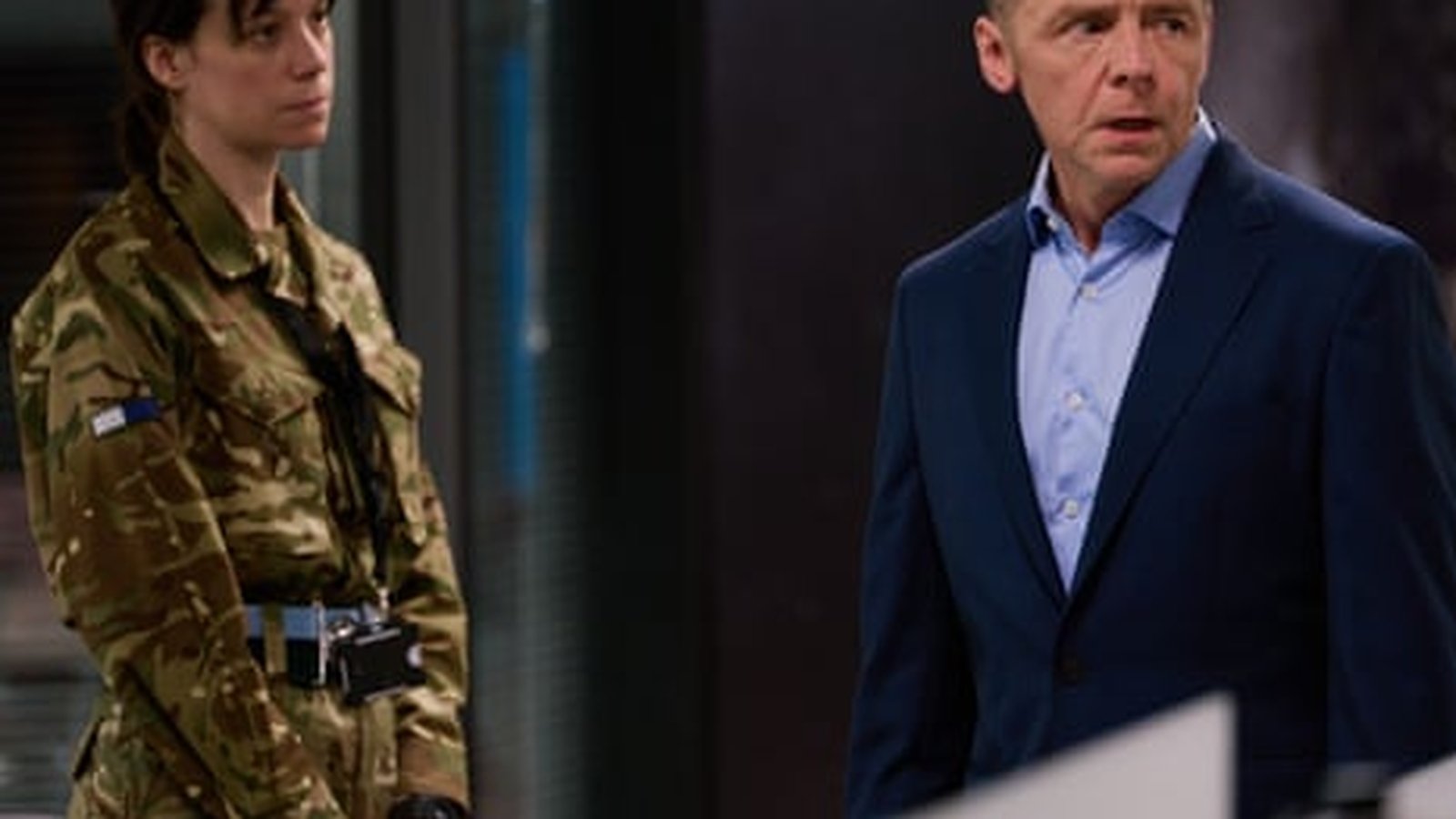 Hannah Khalique-Brown and Simon Pegg in a scene from The Undeclared War series