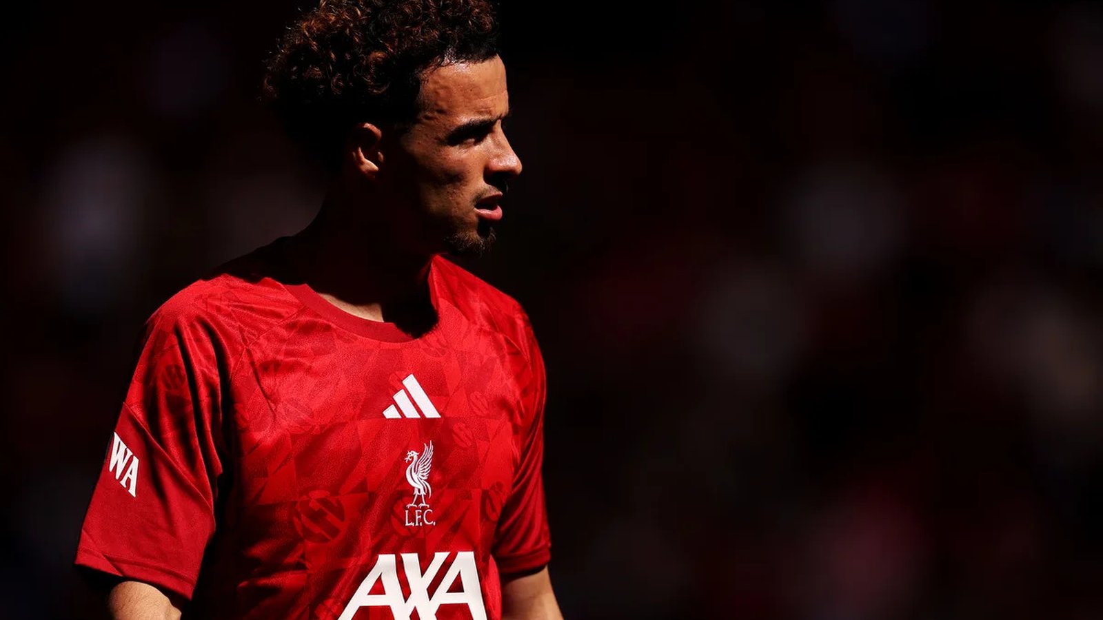 Curtis Jones wearing a red Liverpool football kit during a match