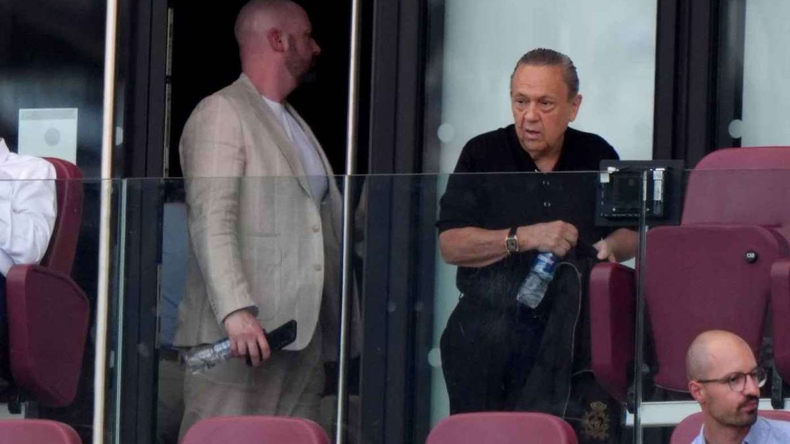 David Sullivan sitting in a stadium executive box during a football match