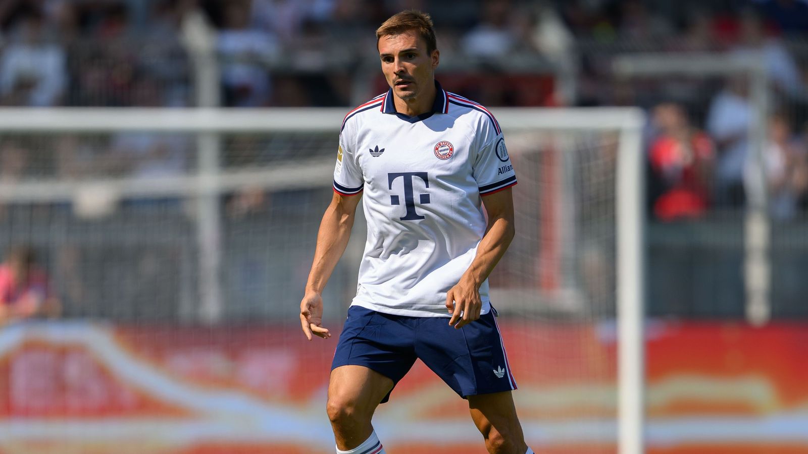 Joao Palhinha wearing the white Bayern Munich football kit on the pitch