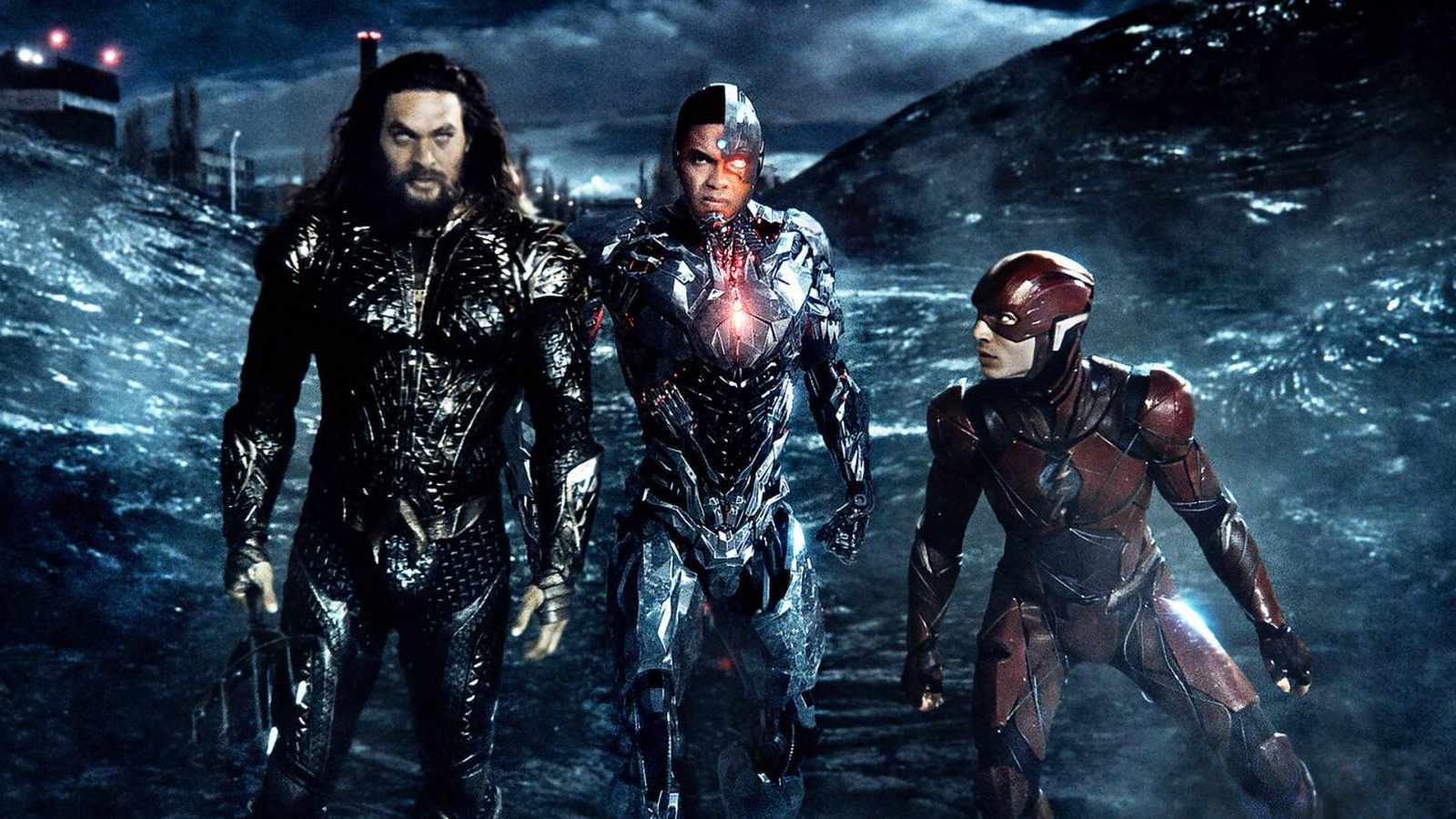Aquaman, Cyborg, and The Flash standing together in a dark cinematic scene