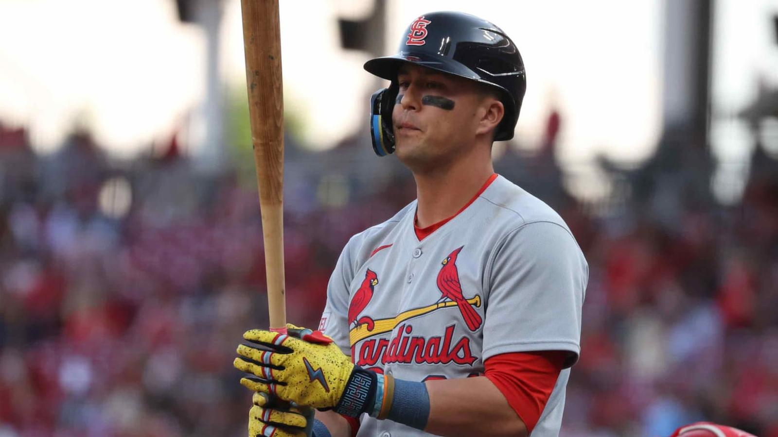 St. Louis Cardinals outfielder Lars Nootbaar wearing a helmet and holding a baseball bat