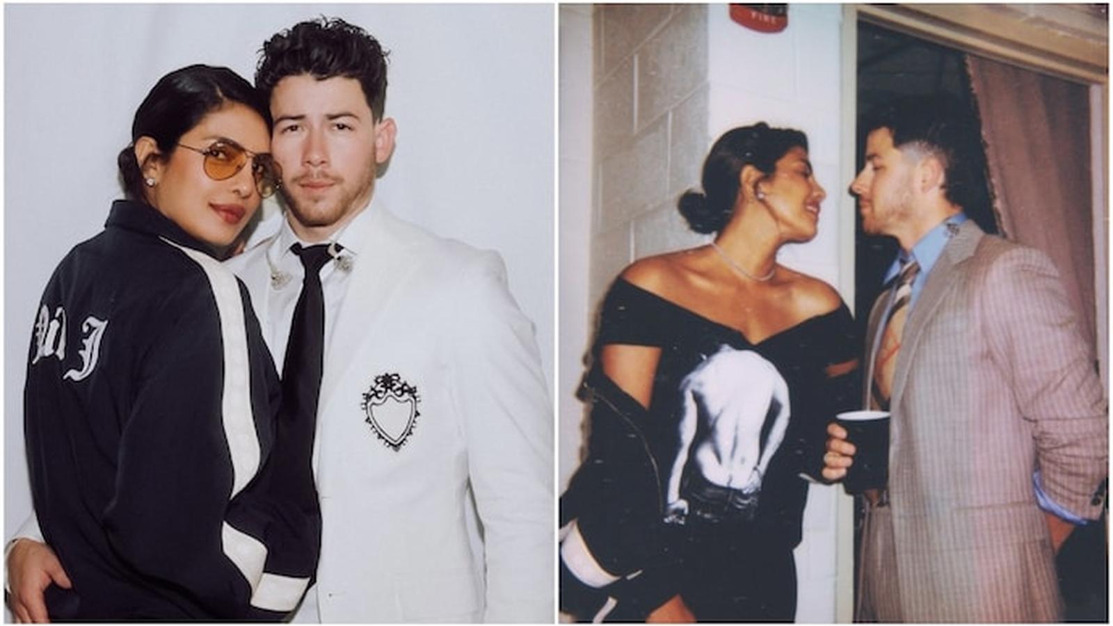 Priyanka Chopra and Nick Jonas posing together in stylish outfits during a tour event
