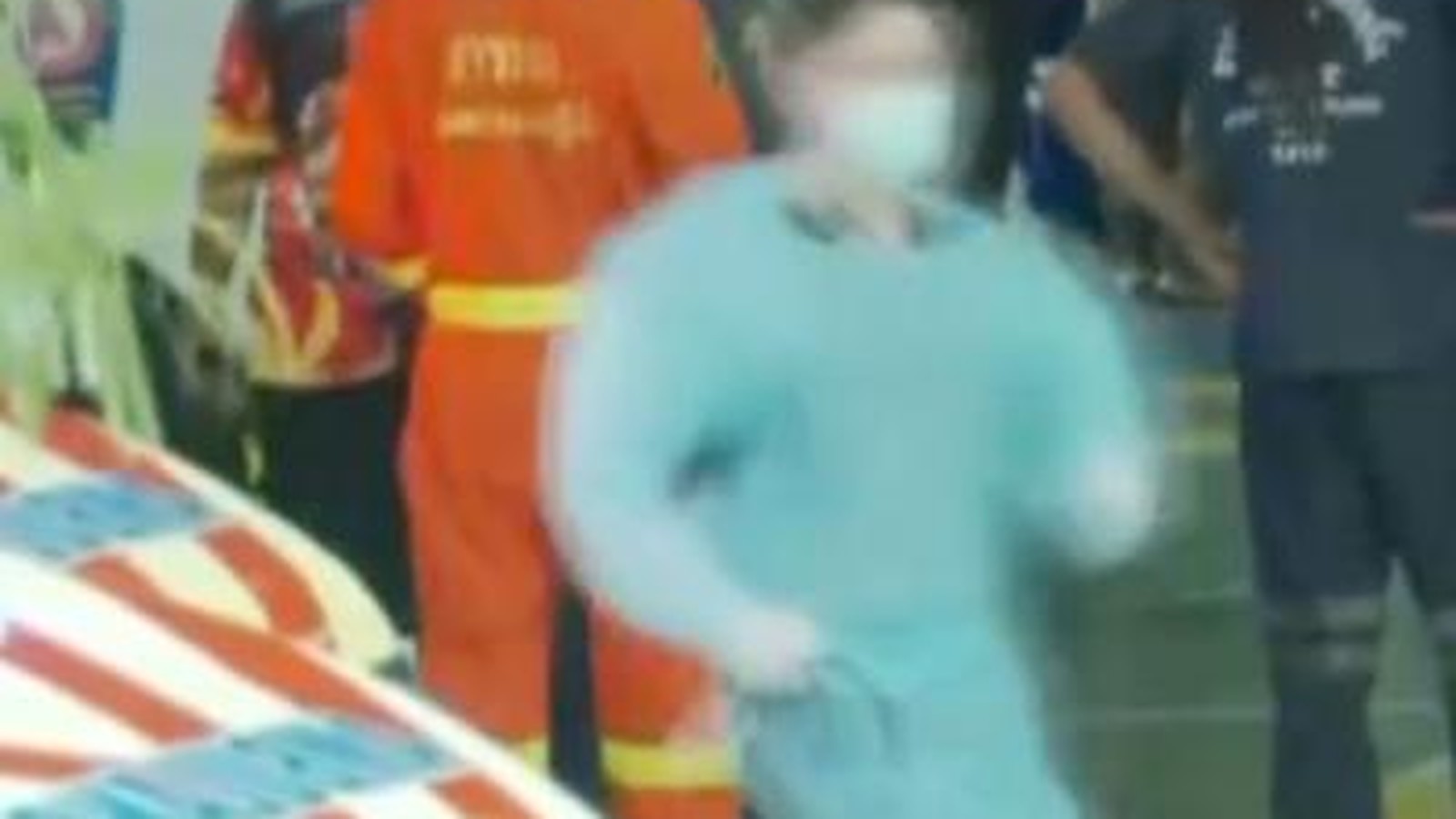 Thai emergency responders and medical staff at the scene of a major incident