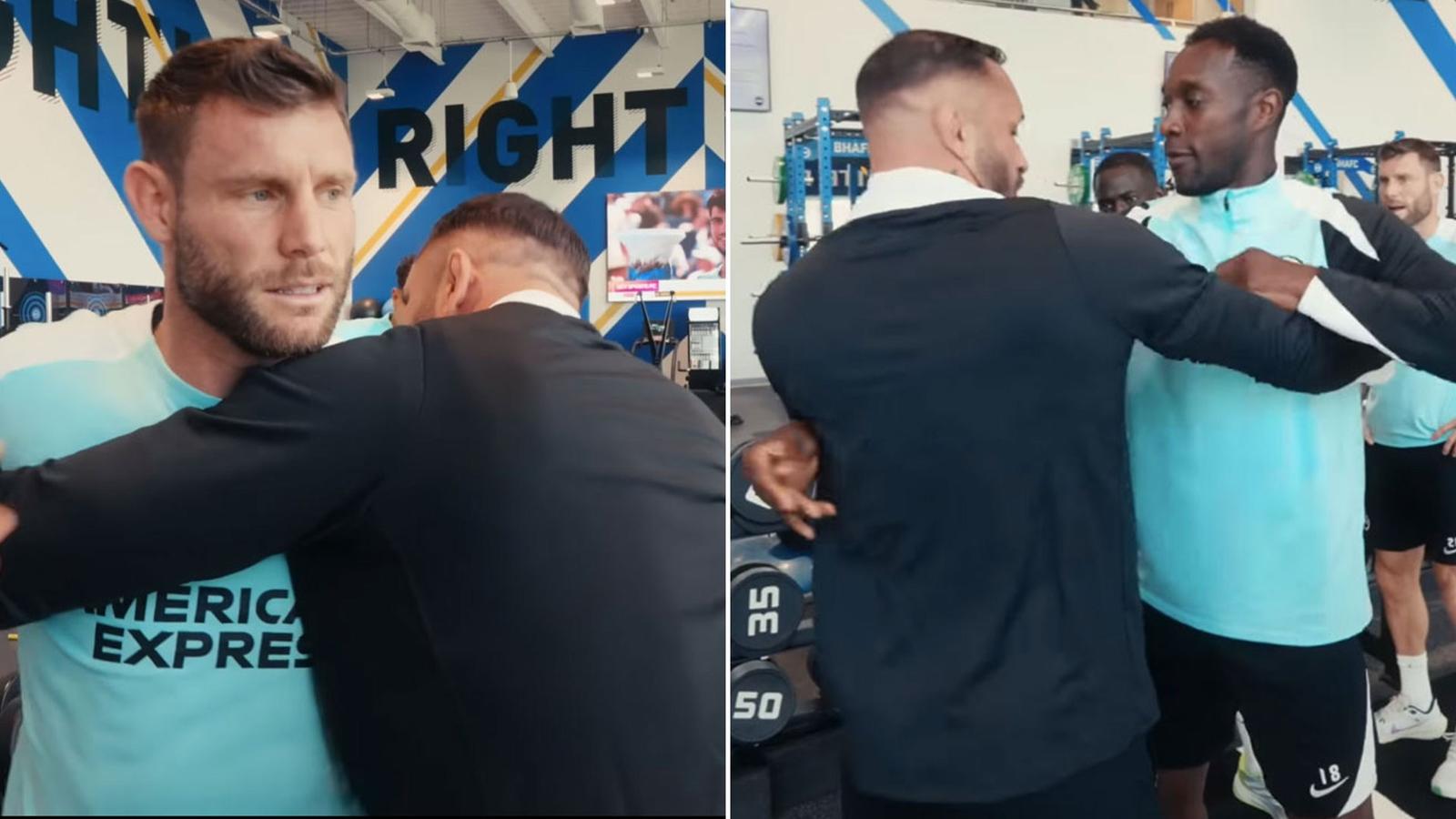 Brighton football players practicing wrestling techniques with an MMA instructor in the gym