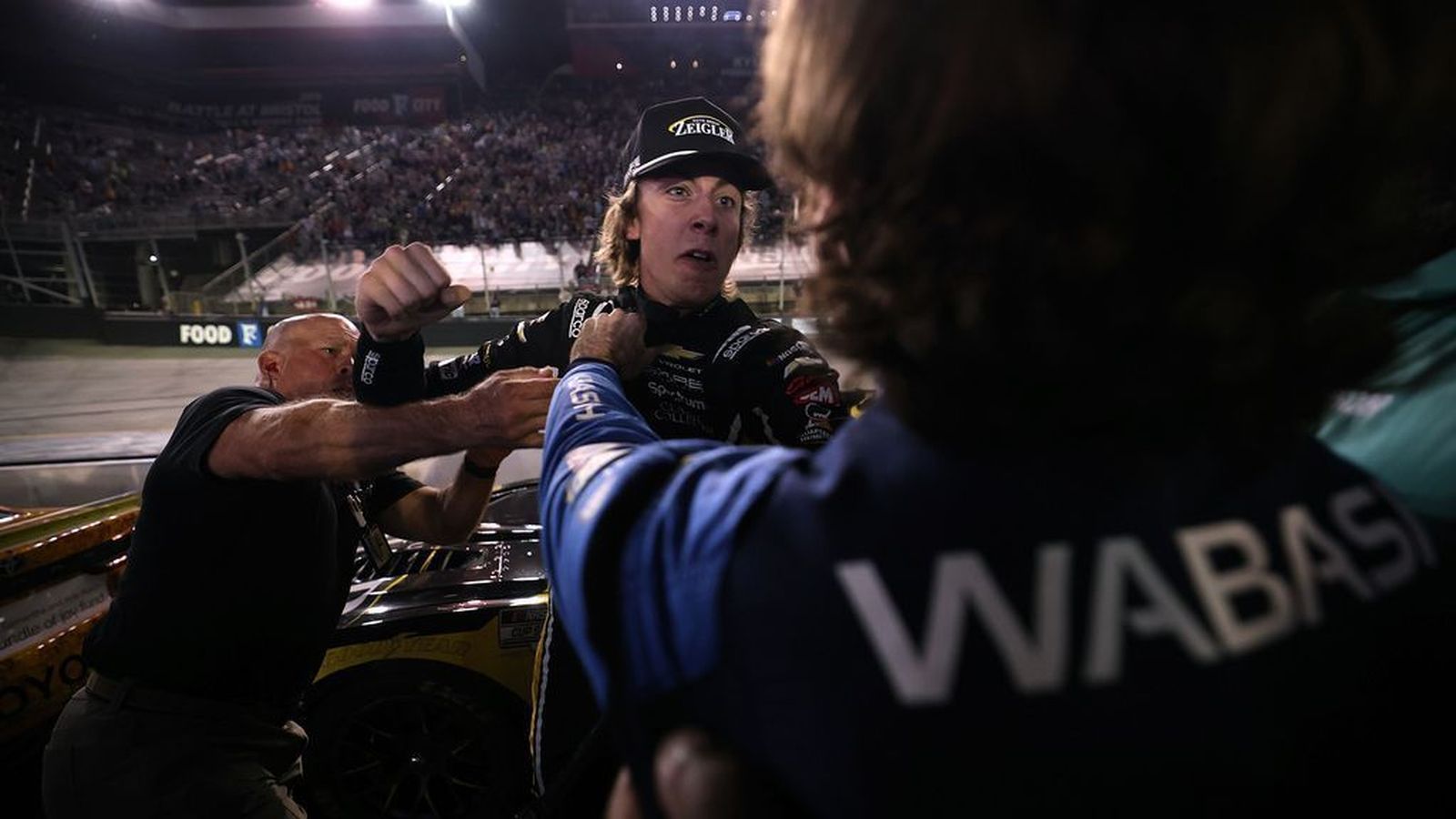Carson Hocevar and Ryan Blaney in a heated confrontation on the Bristol pit road